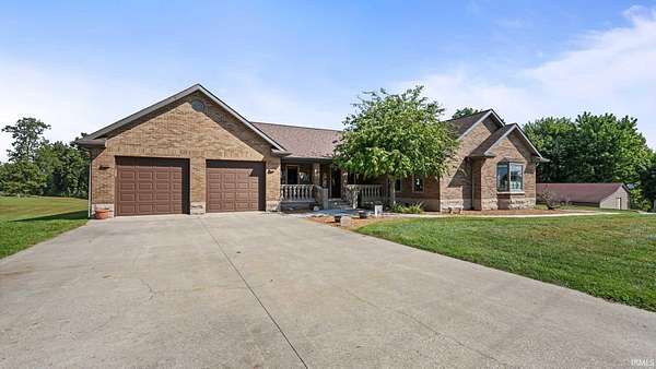 8.5 Acres of Land with Home for Sale in Heltonville, Indiana