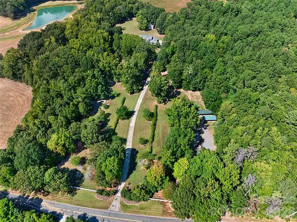 7.57 Acres of Land with Home for Sale in Lancaster, South Carolina