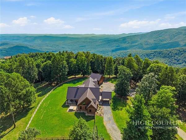 80.1 Acres of Recreational Land with Home for Sale in Purlear, North Carolina