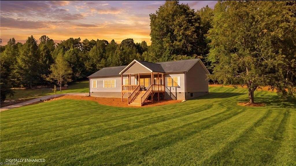 4.2 Acres of Land with Home for Sale in Ferguson, North Carolina
