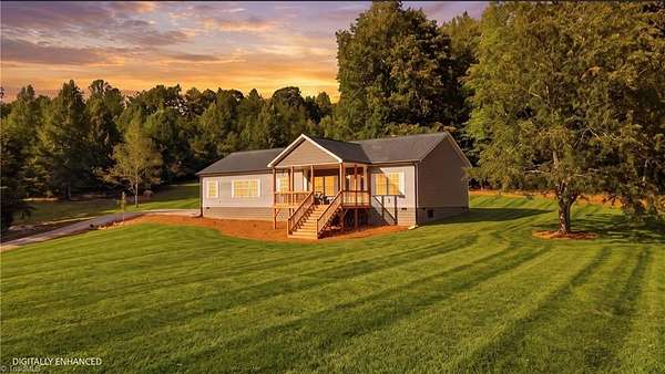 4.2 Acres of Land with Home for Sale in Ferguson, North Carolina
