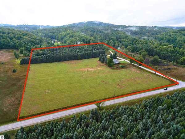 11.5 Acres of Land with Home for Sale in Cedar, Michigan