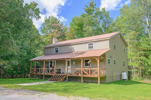 1.63 Acres of Land with Home for Sale in Lake Clear, New York