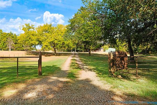2.38 Acres of Land with Home for Sale in Powderly, Texas