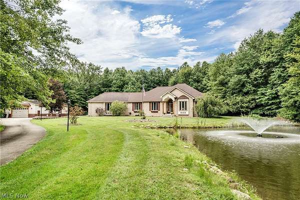 4.77 Acres of Land with Home for Sale in North Jackson, Ohio