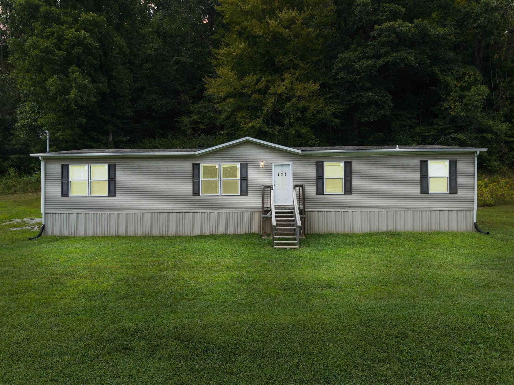5 Acres of Land with Home for Sale in Olive Hill, Kentucky