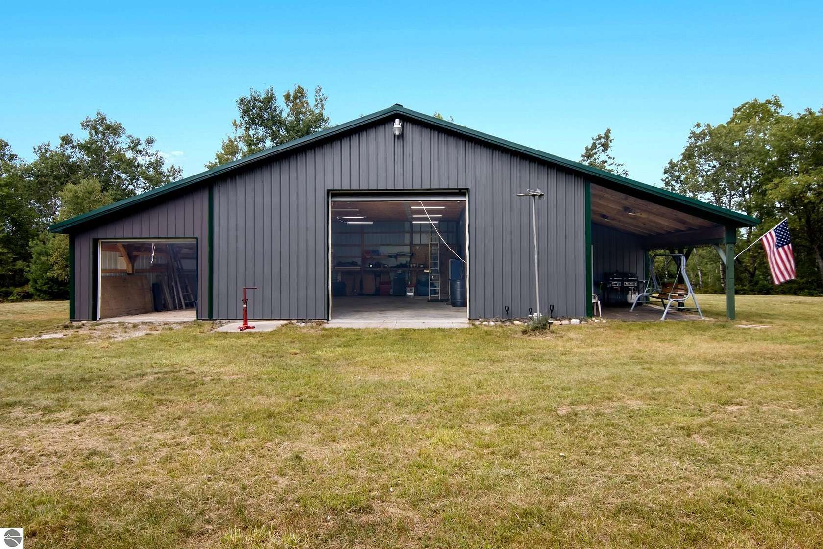 10 Acres of Recreational Land with Home for Sale in Mancelona, Michigan