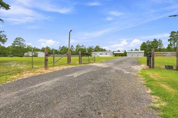 2 Acres of Land with Home for Sale in DeFuniak Springs, Florida