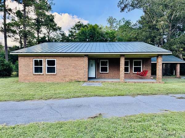 9.4 Acres of Land with Home for Sale in Samson, Alabama