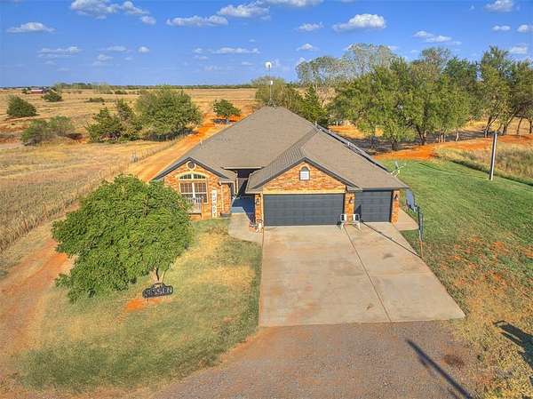 5.39 Acres of Land with Home for Sale in Cashion, Oklahoma