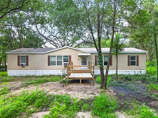 3 Acres of Land with Home for Sale in Weirsdale, Florida