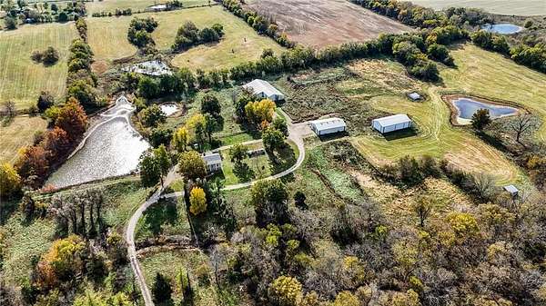 33.2 Acres of Land with Home for Sale in Creighton, Missouri