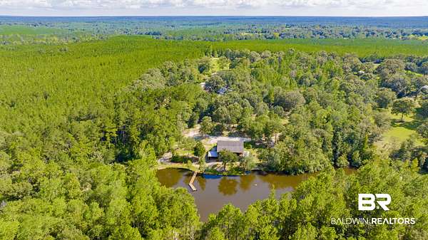 8.49 Acres of Land with Home for Sale in Bay Minette, Alabama