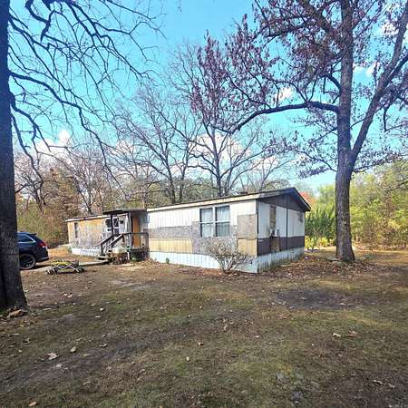 5 Acres of Land with Home for Sale in Boles, Arkansas