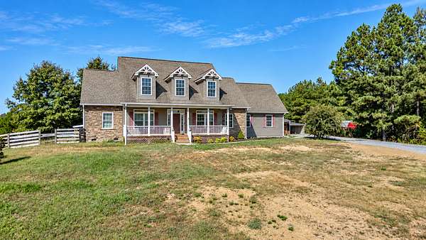5 Acres of Land with Home for Sale in Oldfort, Tennessee
