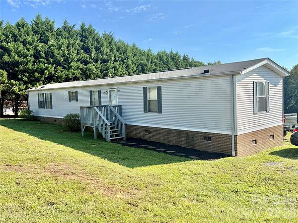 2.48 Acres of Land with Home for Sale in Hiddenite, North Carolina