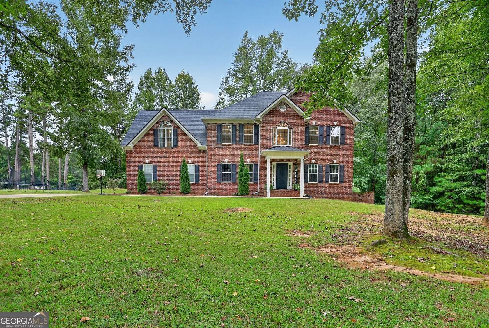 4.47 Acres of Land with Home for Sale in Fayetteville, Georgia