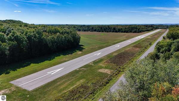 0.22 Acres of Land for Sale in Kewadin, Michigan