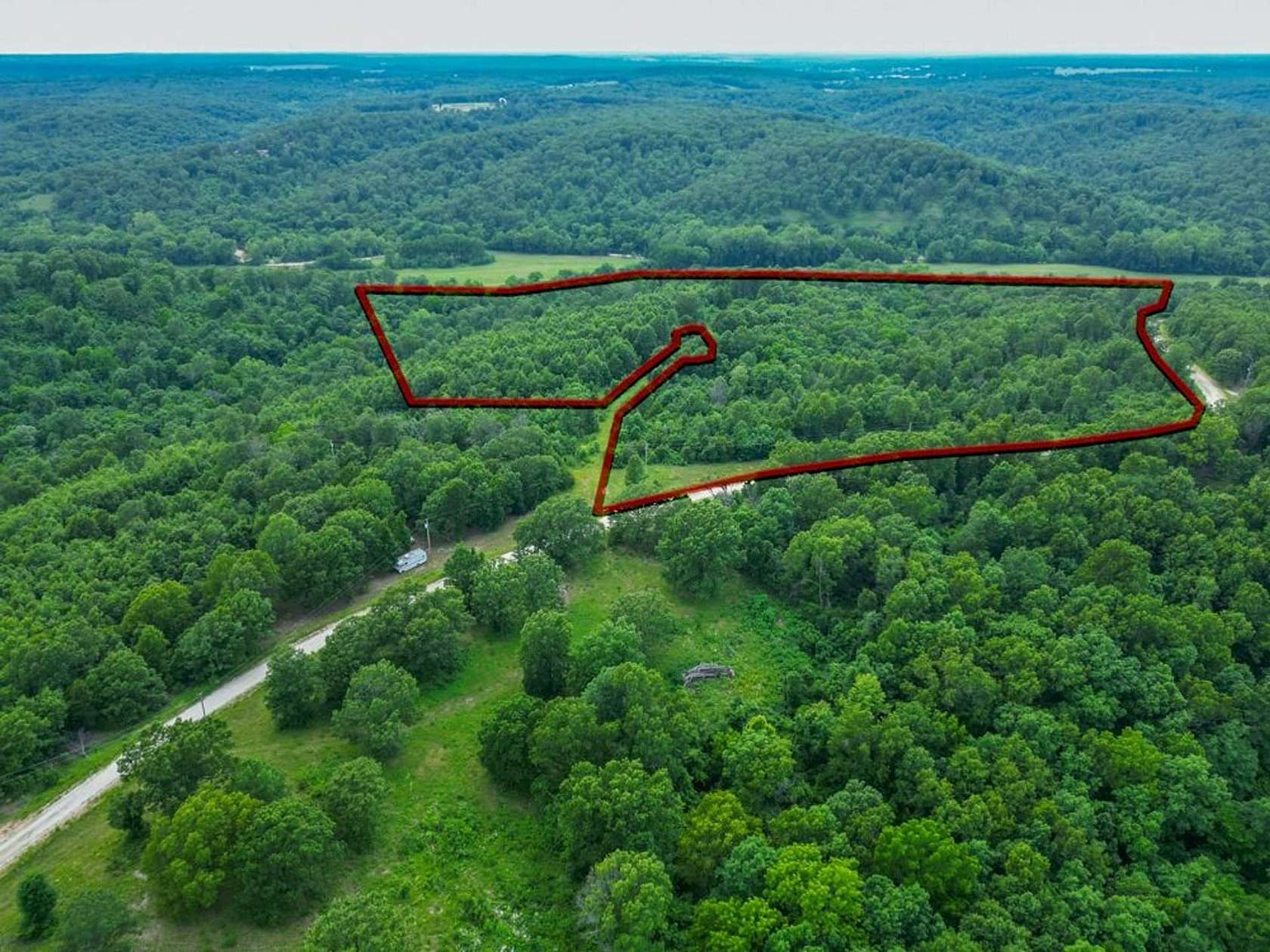 54 Acres of Land for Sale in Tunas, Missouri