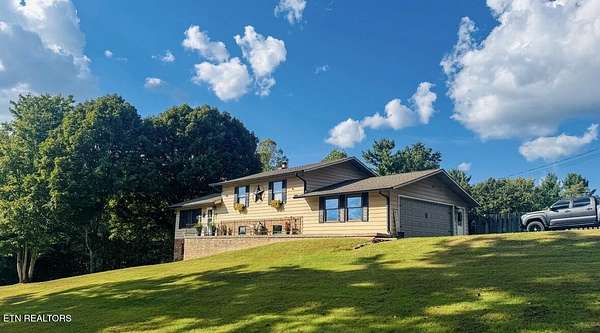 33 Acres of Land with Home for Sale in Oneida, Tennessee