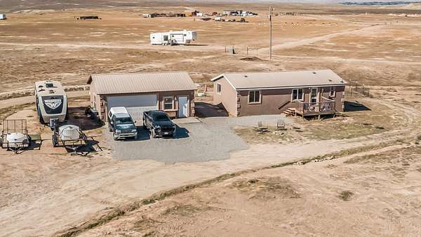 10 Acres of Land with Home for Sale in Loma, Colorado