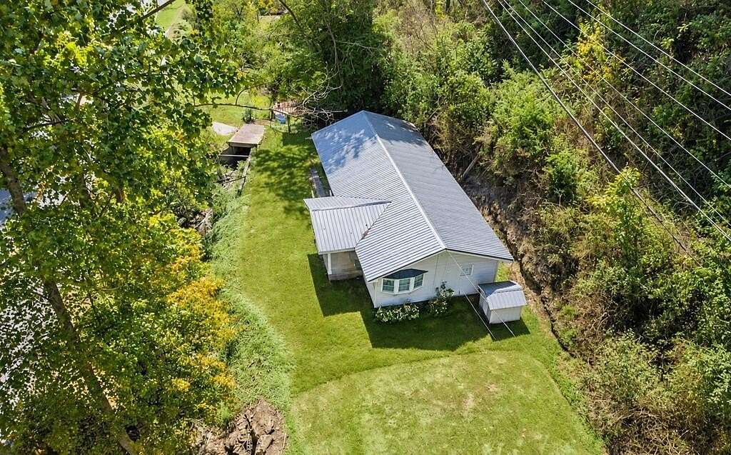 80 Acres of Land with Home for Sale in Fedscreek, Kentucky