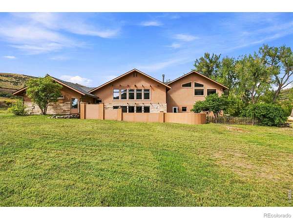 35 Acres of Agricultural Land with Home for Sale in Loveland, Colorado