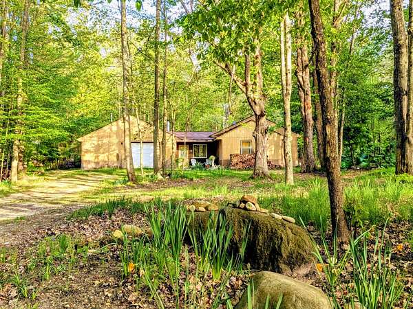 2 Acres of Land with Home for Sale in Custer, Michigan