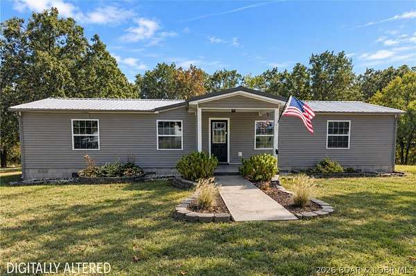 3.5 Acres of Land with Home for Sale in Brumley, Missouri