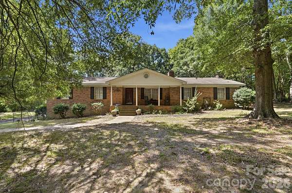 6.68 Acres of Land with Home for Sale in Monroe, North Carolina