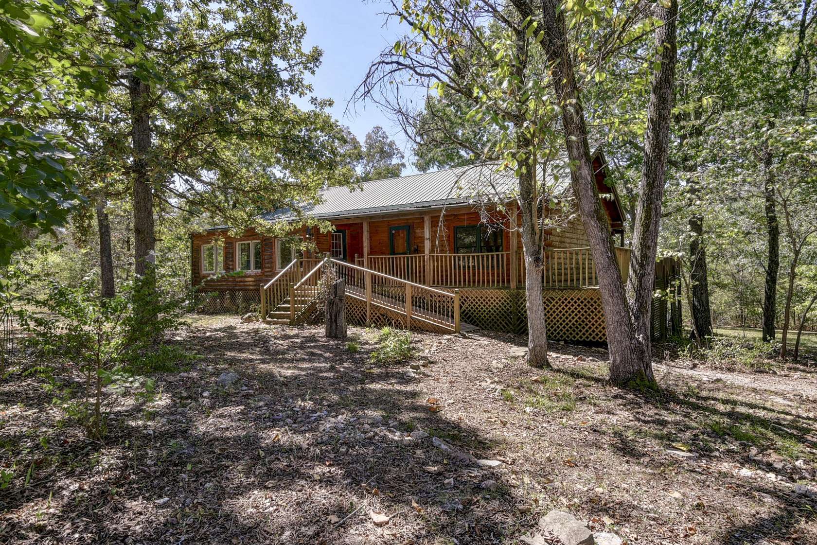 7 Acres of Land with Home for Sale in Lampe, Missouri