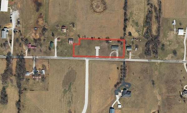 1.9 Acres of Land with Home for Auction in Nevada, Missouri