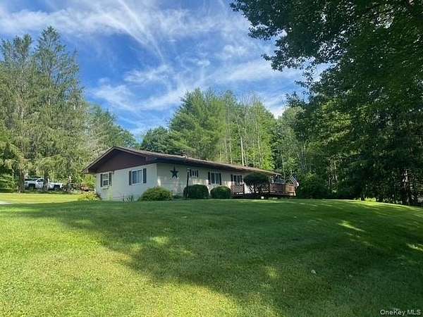 3.33 Acres of Land with Home for Sale in Kenoza Lake, New York