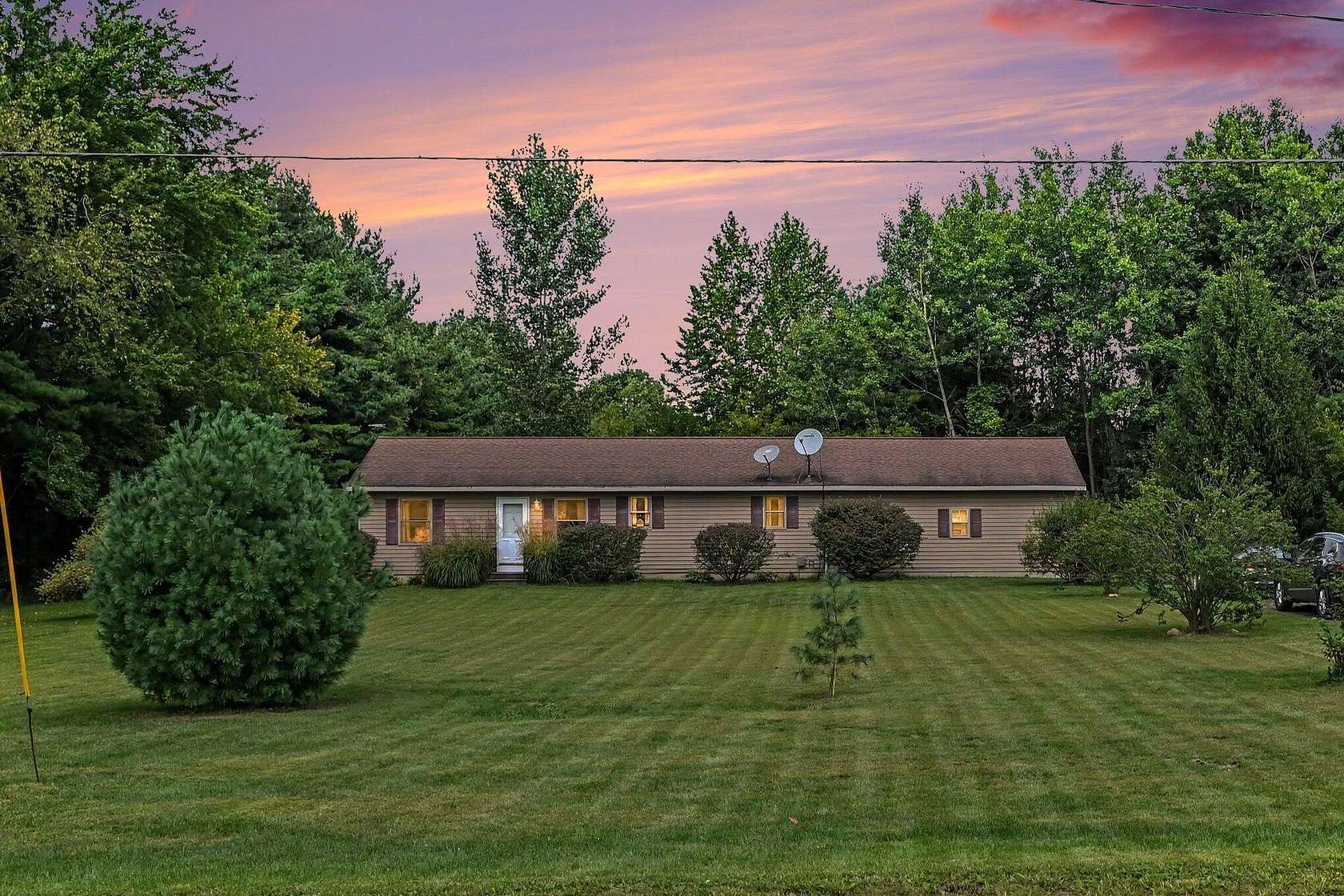 2 Acres of Land with Home for Sale in Eau Claire, Michigan