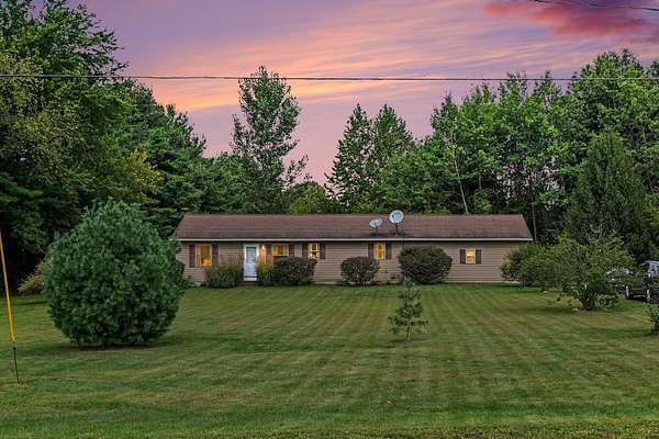2 Acres of Land with Home for Sale in Eau Claire, Michigan