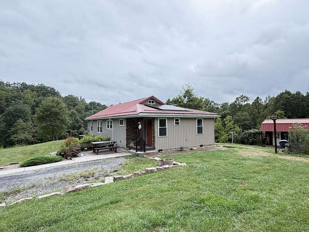 14.2 Acres of Land with Home for Sale in Scarbro, West Virginia