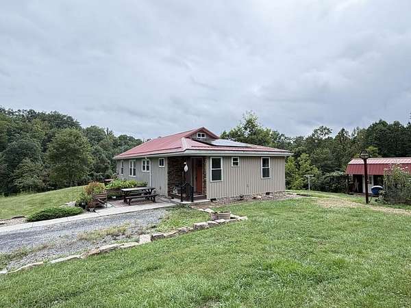 14.2 Acres of Land with Home for Sale in Scarbro, West Virginia