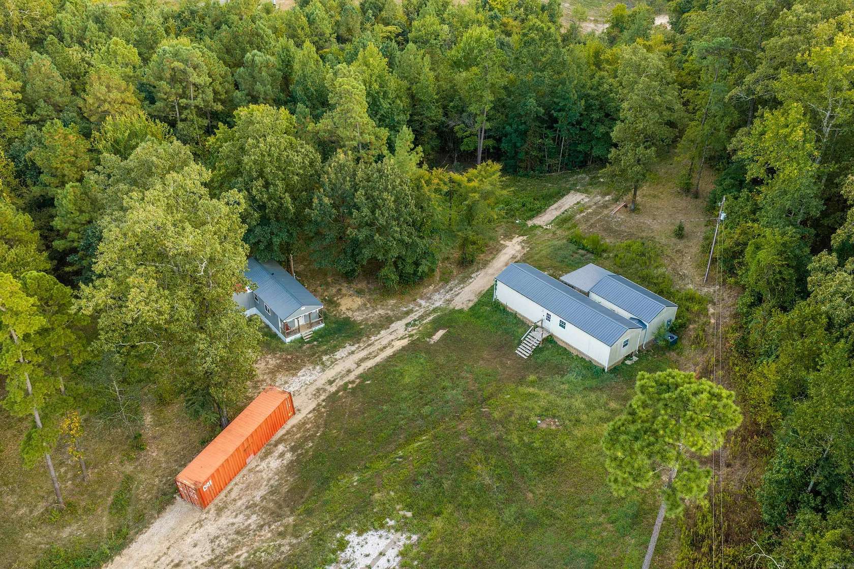 6.47 Acres of Land with Home for Sale in Bismarck, Arkansas