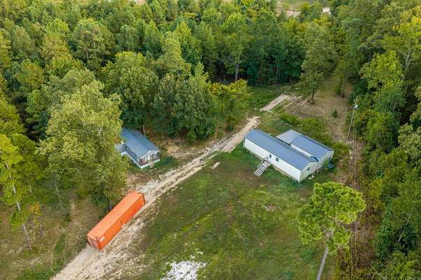 6.47 Acres of Land with Home for Sale in Bismarck, Arkansas
