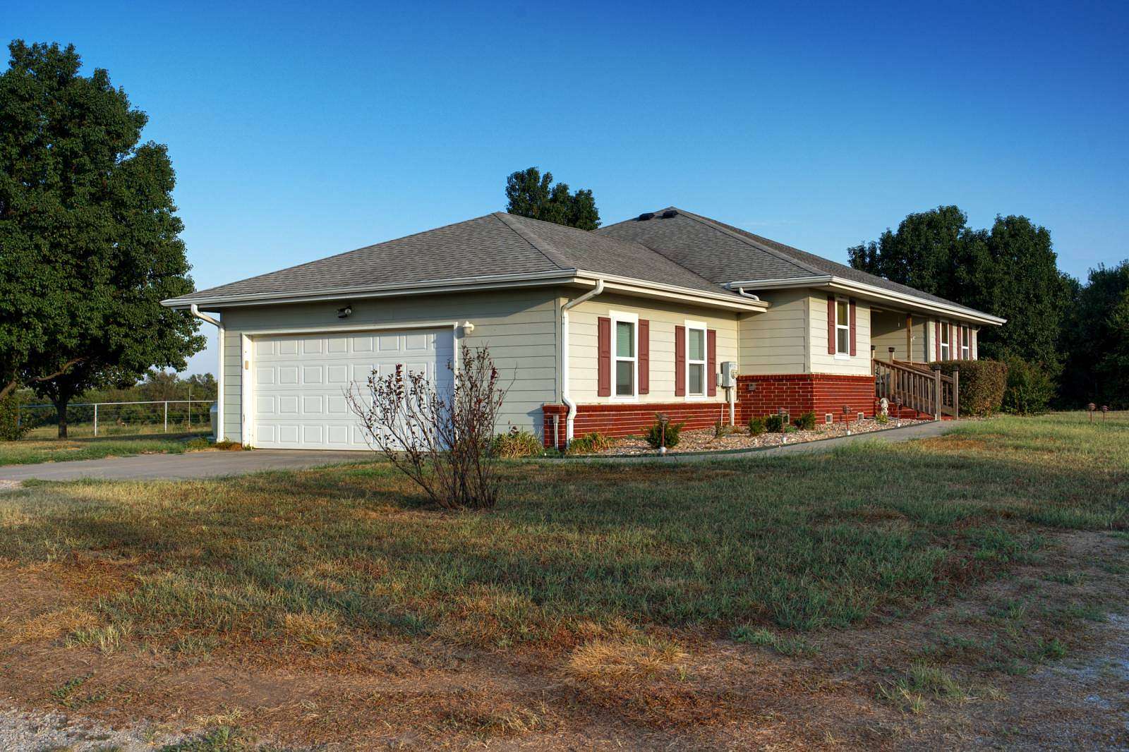240 Acres of Agricultural Land with Home for Auction in Coffeyville, Kansas