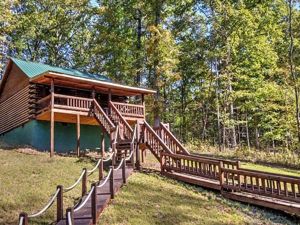 17.4 Acres of Land with Home for Sale in Indian Mound, Tennessee