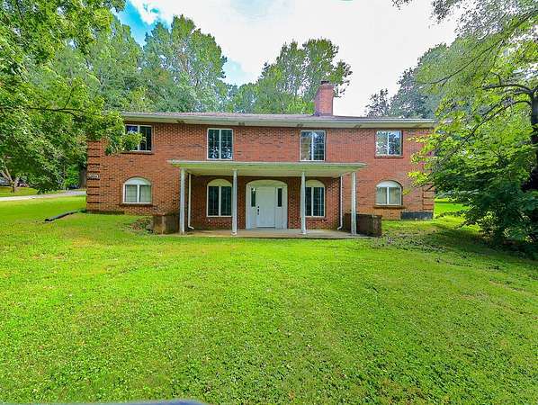 1.74 Acres of Land with Home for Auction in Louisville, Kentucky
