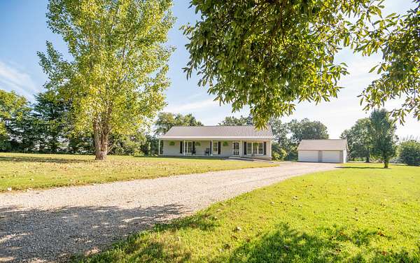 4.88 Acres of Land with Home for Sale in Puxico, Missouri