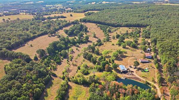 157 Acres of Land with Home for Sale in Grovespring, Missouri
