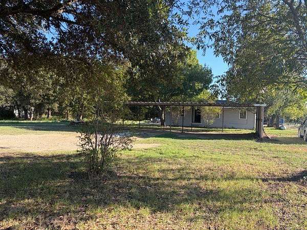 3.58 Acres of Land with Home for Sale in Scurry, Texas