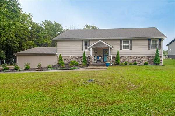 3 Acres of Land with Home for Sale in Liberty, Missouri
