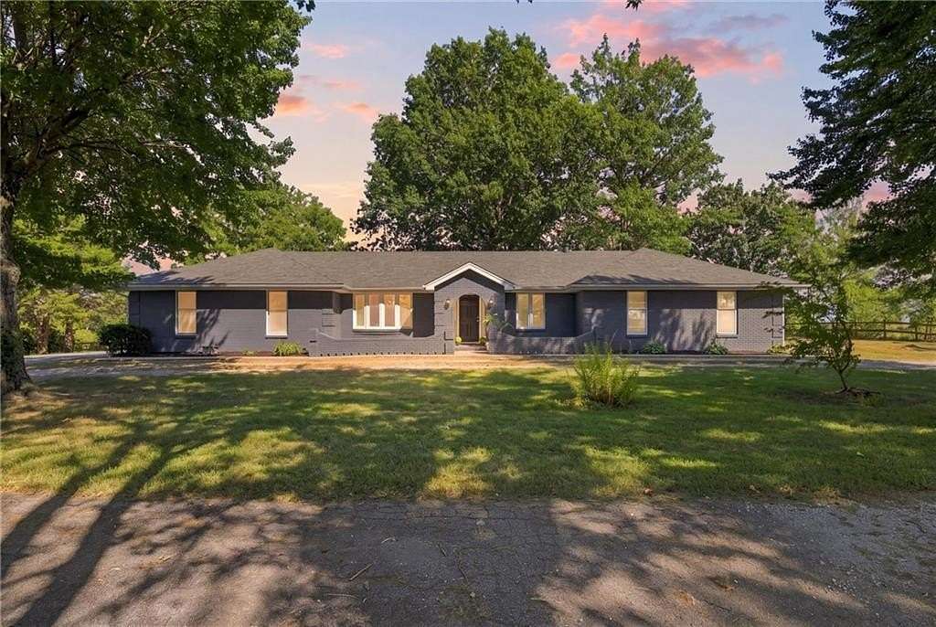 6.73 Acres of Land with Home for Sale in Smithville, Missouri