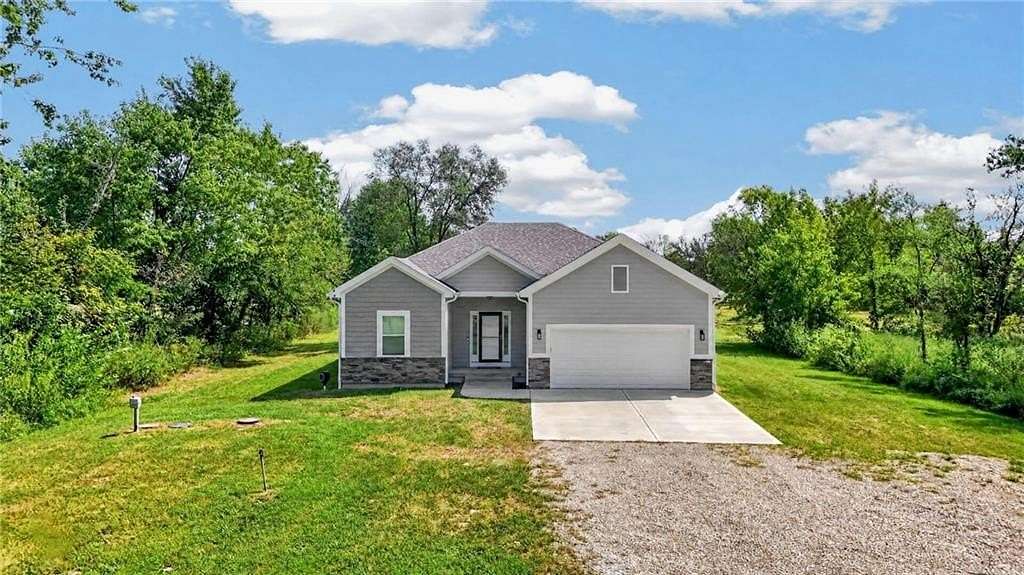 5.5 Acres of Land with Home for Sale in Holden, Missouri