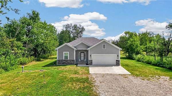 5.5 Acres of Land with Home for Sale in Holden, Missouri