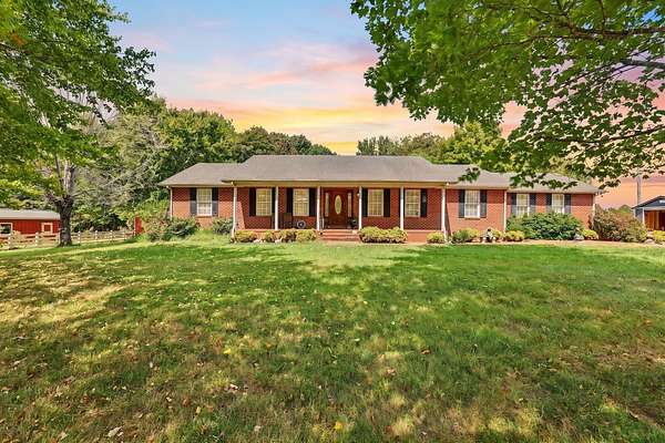 6.53 Acres of Land with Home for Sale in Chapmansboro, Tennessee